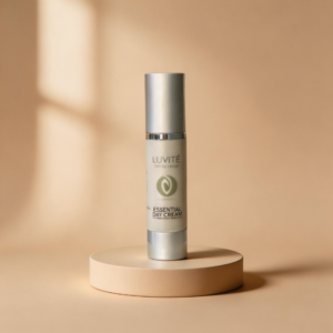 Luvité Essential Day Cream luxury moisturiser on beige pedestal